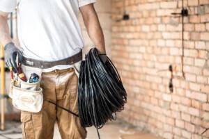 electrician with tools working on a construction 2025 04 02 07 56 00 utc